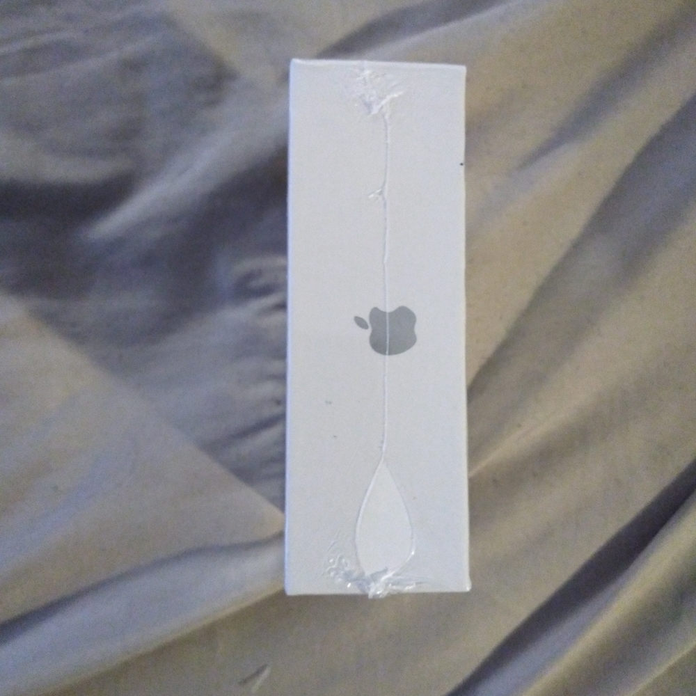 White Apple Airpods with charging case